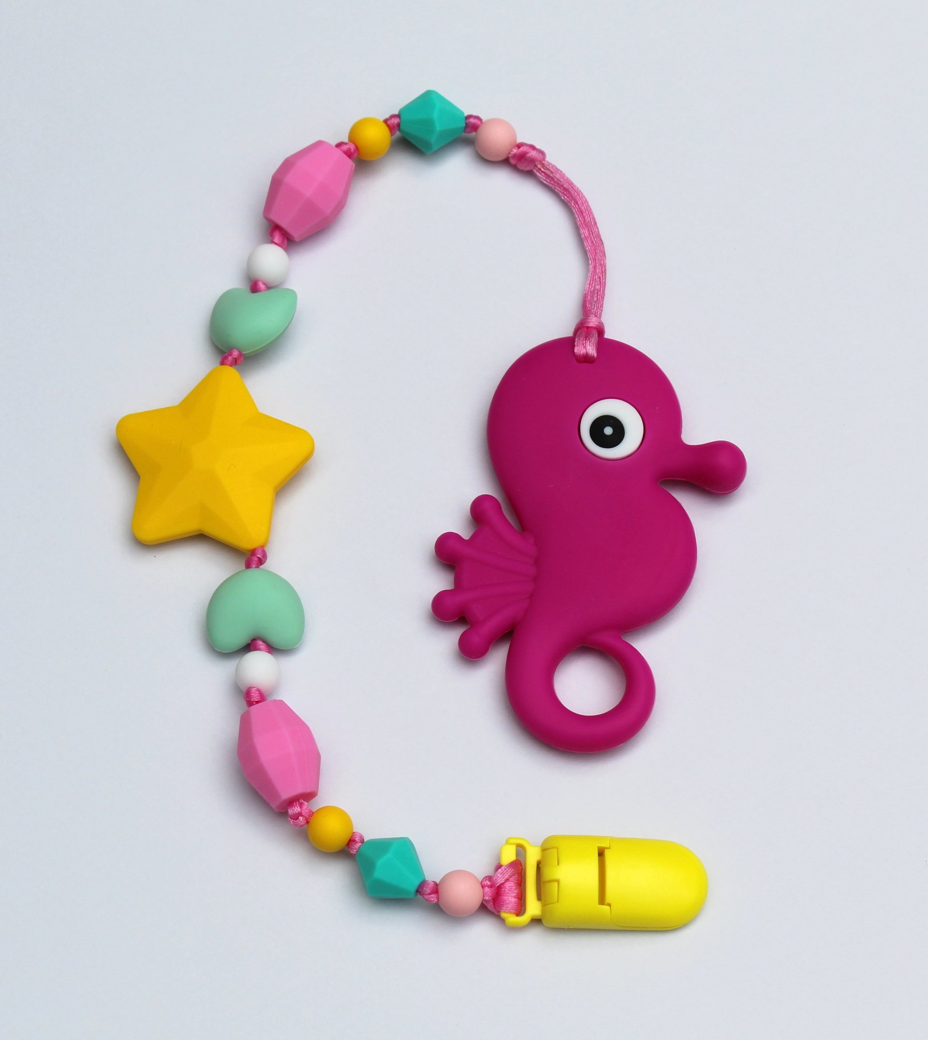 Силиконовый прорезыватель с держателем Океан, фуксия